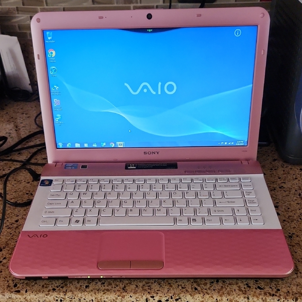 Sony Pink and White VAIO Laptop with Compact Design